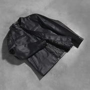 Styled Fit Perspective of Austere Matte أسود جاكيت بايكر جلد رجالي on Model - Natural Daylight Drape
