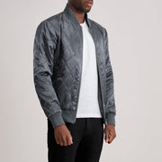 
Grey Satin Varsity Jacket - عرض خلفي يوضح تفصيل الأكتاف المتقن والحاشية النظيفة