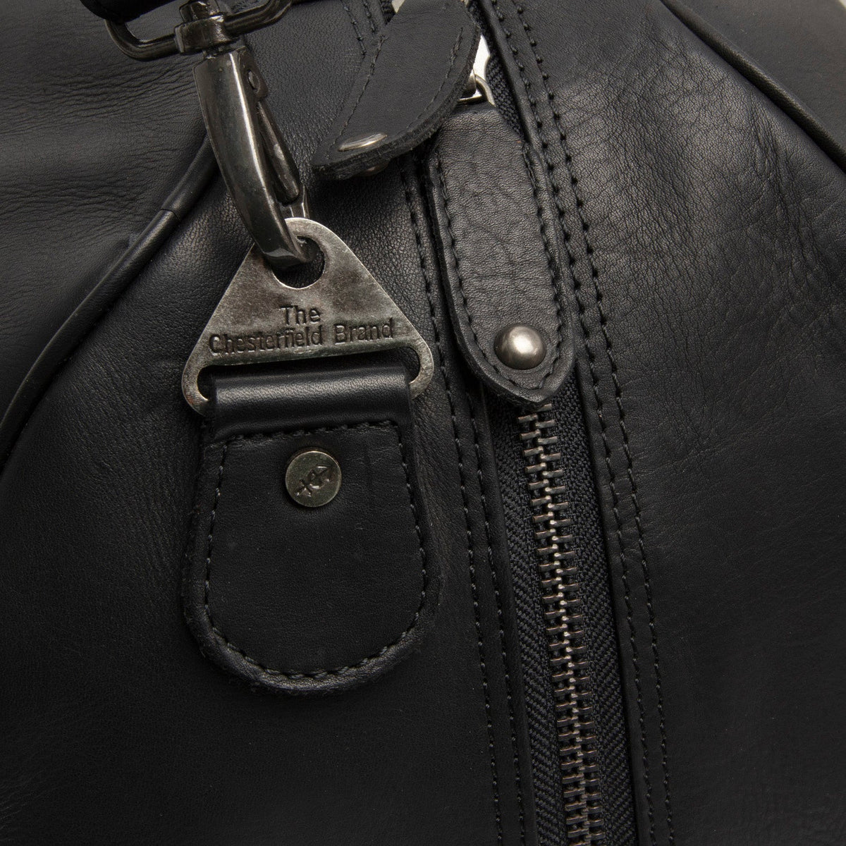 Solid Antique Brass Hardware &amp; Heavy-Duty Dual Zipper Detail on Rivaro Full-Grain Leather Weekender Bag نسائي