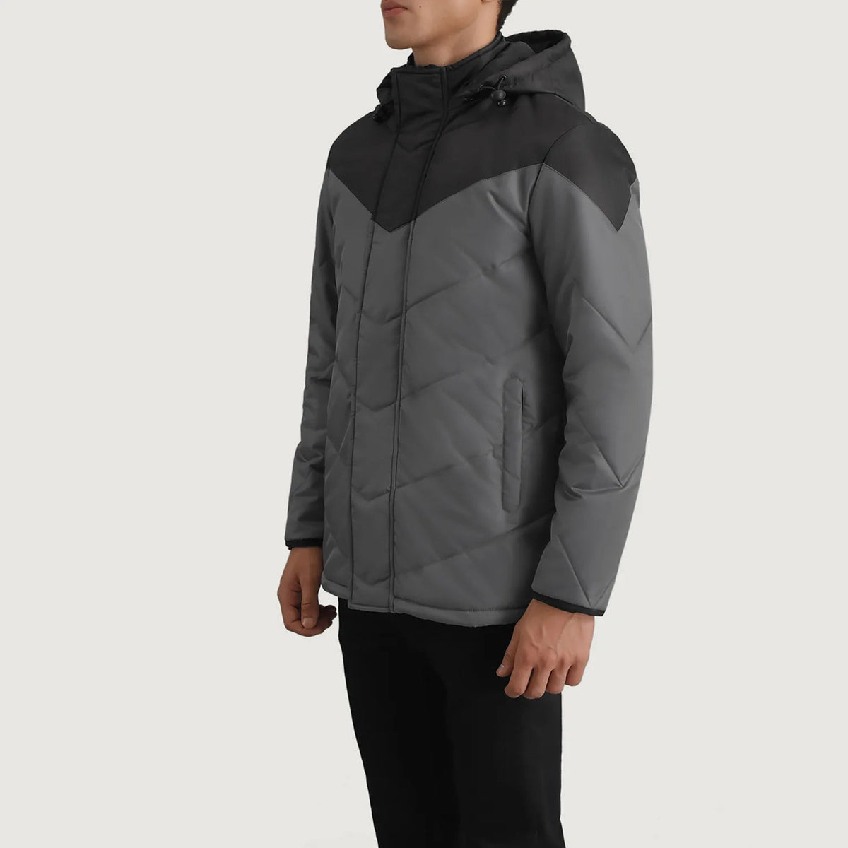 
Black & Grey Full-Grain Leather Hooded Jacket - عرض خلفي يوضح تفصيل الأكتاف المتقن والحاشية النظيفة