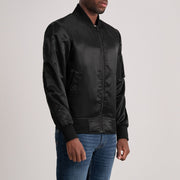 
Black Satin Bomber Jacket - عرض خلفي يوضح تفصيل الأكتاف المتقن والحاشية النظيفة