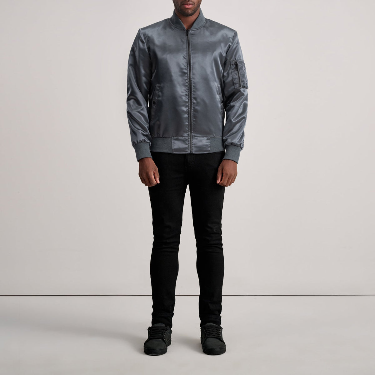 Close-Up Detail of Varsity &amp; Zipper Hardware on Quinton MA-1 Grey جاكيت بومبر جلد رجالي