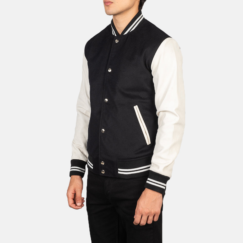 
Black & White Sheepskin Leather Varsity Jacket - عرض خلفي يوضح تفصيل الأكتاف المتقن والحاشية النظيفة